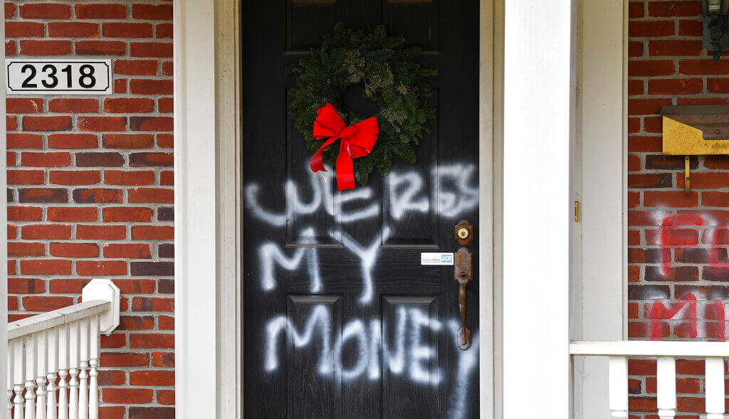 graffiti on McConnell's door saying Where's My Money while Americans wait for stimulus checks