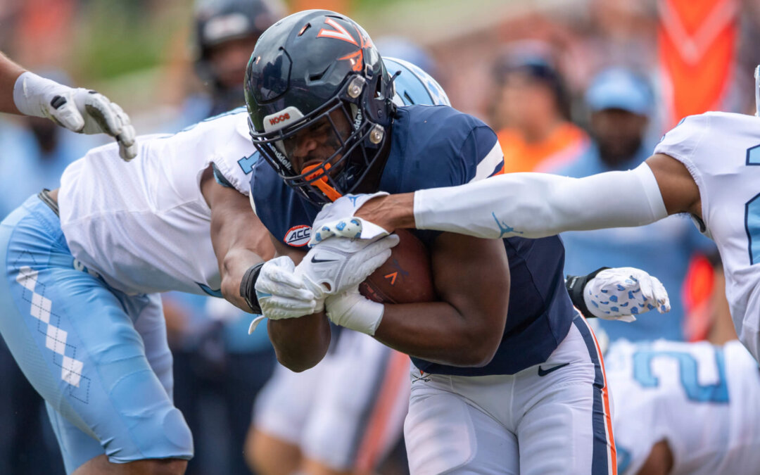 Virginia player wounded in deadly attack returns for a new season as an inspiration to his teammates
