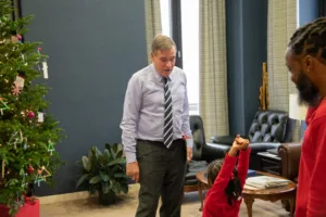 Inside Sen. Mark Warner's annual holiday tradition at Capitol Hill: From handmade ornaments to festive serenades