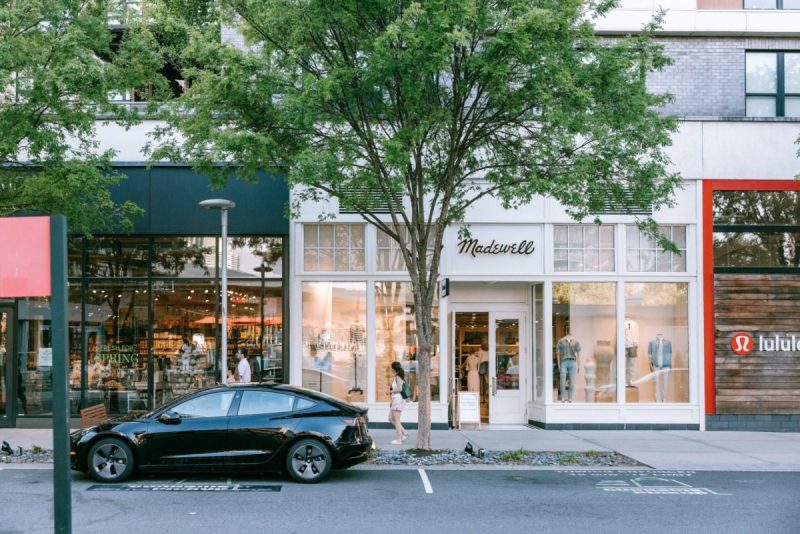an exterior shot of the street and some storefronts along the mosaic district in fairfax, va.