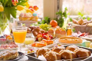 A brunch table with mimosas and pastries