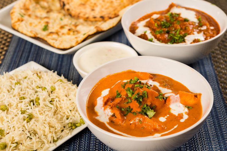 Authentic Indian Food: Butter chicken curry, lamb vindaloo, basmati rice, nan bread and yoghurt raita