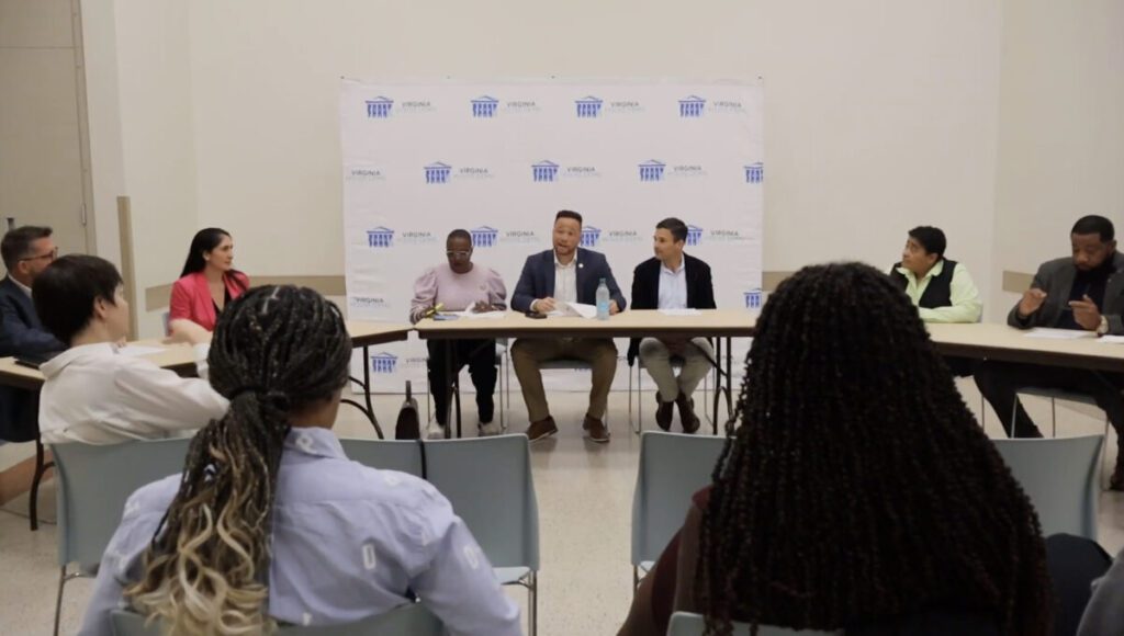 Photo of an event roundtable where several Virginia lawmakers and advocates talk about recent federal cuts.