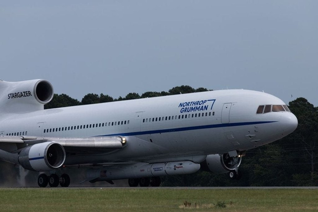 A Northrop Grumman Pegasus XL rocket is affixed to the bottom of the company’s Stargazer, a modified L-1011 aircraft