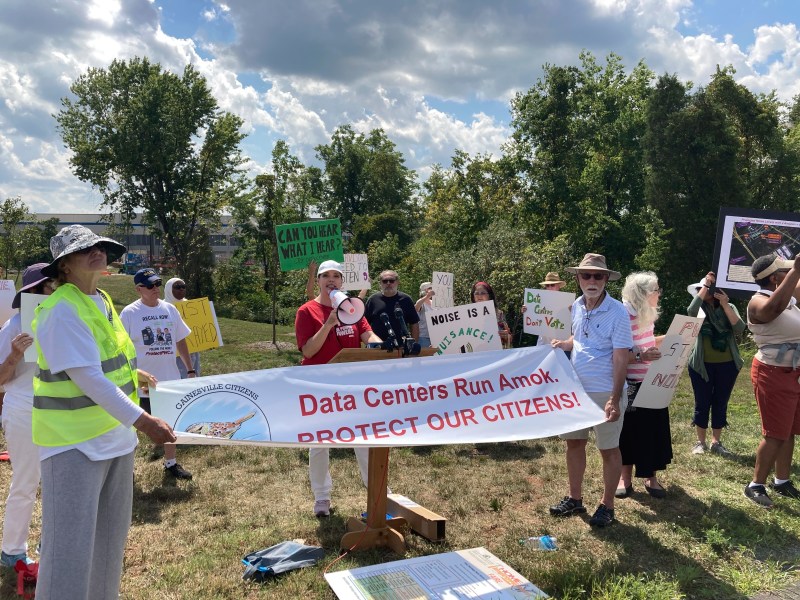 Spencer Snakard, president of Protect Fauquier, speaks Aug. 29, 2022, at a rally near Manassas, Va., protesting a newly built data center for Amazon Web Services. (AP Photo/Matthew Barakat, File)