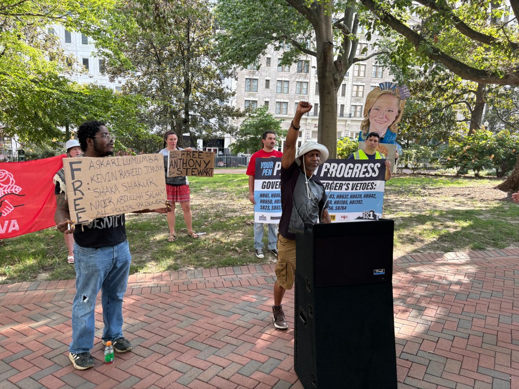 Advocates brave heat to protest Spanberger vetoes